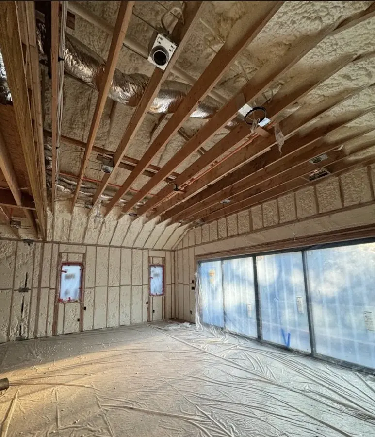 Interior walls and ceiling insulated with spray foam during new construction in Snohomish